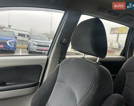 Черный Мицубиси Грандис, объемом двигателя 2.4 л и пробегом 212 тыс. км за 5300 $, фото 22 на Automoto.ua