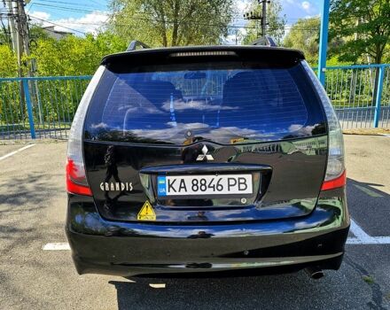 Черный Мицубиси Грандис, объемом двигателя 2.4 л и пробегом 242 тыс. км за 3900 $, фото 2 на Automoto.ua
