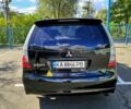 Черный Мицубиси Грандис, объемом двигателя 2.4 л и пробегом 242 тыс. км за 3900 $, фото 2 на Automoto.ua