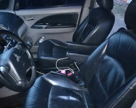 Чорний Міцубісі Грандіс, об'ємом двигуна 2.4 л та пробігом 261 тис. км за 6900 $, фото 2 на Automoto.ua