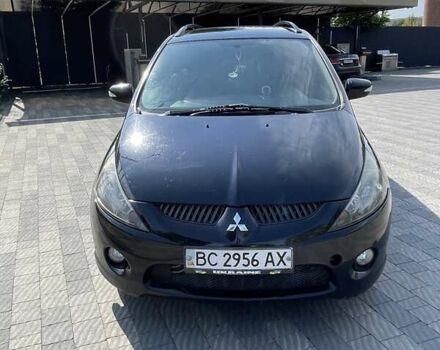 Черный Мицубиси Грандис, объемом двигателя 2.38 л и пробегом 300 тыс. км за 6000 $, фото 1 на Automoto.ua