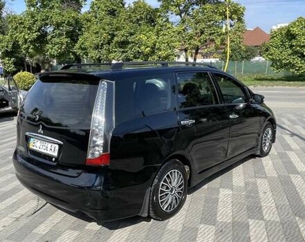 Черный Мицубиси Грандис, объемом двигателя 2.38 л и пробегом 300 тыс. км за 6000 $, фото 3 на Automoto.ua