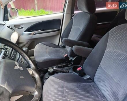 Черный Мицубиси Грандис, объемом двигателя 2.4 л и пробегом 216 тыс. км за 6300 $, фото 24 на Automoto.ua