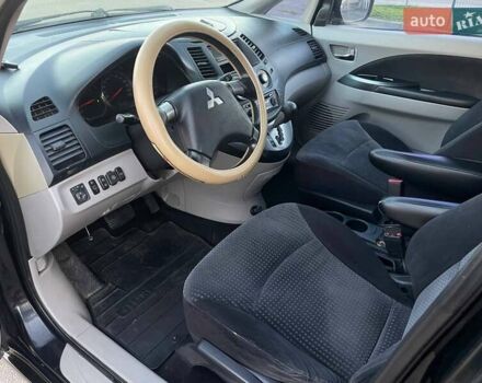 Черный Мицубиси Грандис, объемом двигателя 2.38 л и пробегом 197 тыс. км за 5299 $, фото 12 на Automoto.ua