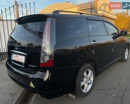 Черный Мицубиси Грандис, объемом двигателя 2.38 л и пробегом 197 тыс. км за 5299 $, фото 5 на Automoto.ua