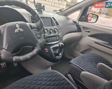 Міцубісі Грандіс 2006 у Первомайськ на Automoto.ua Чорний Міцубісі Грандіс, об'ємом двигуна 2.38 л та пробігом 220 тис. км за 6700 $, фото 13 на Automoto.ua