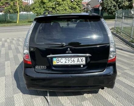 Черный Мицубиси Грандис, объемом двигателя 2.38 л и пробегом 300 тыс. км за 6000 $, фото 6 на Automoto.ua