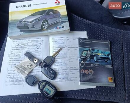 Черный Мицубиси Грандис, объемом двигателя 2.4 л и пробегом 216 тыс. км за 6300 $, фото 46 на Automoto.ua