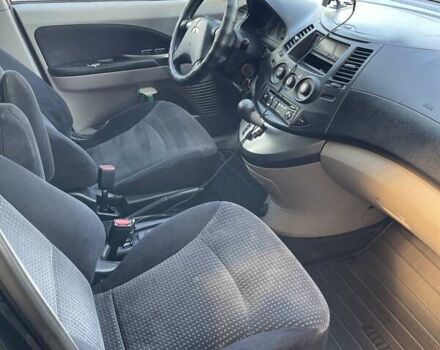 Черный Мицубиси Грандис, объемом двигателя 2.38 л и пробегом 300 тыс. км за 6000 $, фото 13 на Automoto.ua