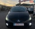 Черный Мицубиси Грандис, объемом двигателя 2.38 л и пробегом 197 тыс. км за 5299 $, фото 1 на Automoto.ua