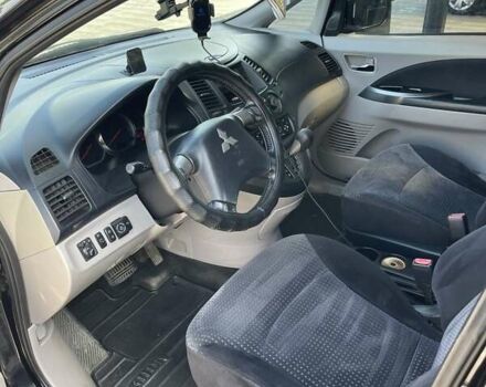 Черный Мицубиси Грандис, объемом двигателя 2.38 л и пробегом 300 тыс. км за 6000 $, фото 12 на Automoto.ua