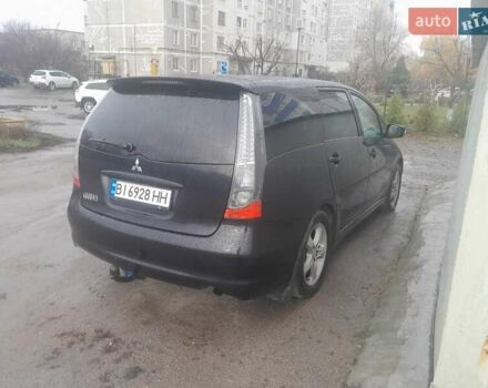 Черный Мицубиси Грандис, объемом двигателя 2.38 л и пробегом 350 тыс. км за 5350 $, фото 2 на Automoto.ua