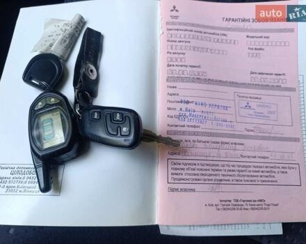 Черный Мицубиси Грандис, объемом двигателя 2.4 л и пробегом 216 тыс. км за 6300 $, фото 39 на Automoto.ua