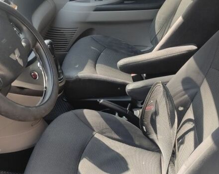 Черный Мицубиси Грандис, объемом двигателя 2.4 л и пробегом 380 тыс. км за 4400 $, фото 5 на Automoto.ua