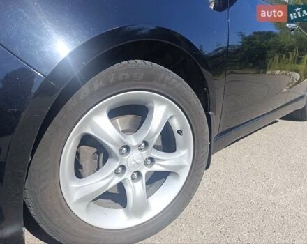 Черный Мицубиси Грандис, объемом двигателя 2.4 л и пробегом 216 тыс. км за 6300 $, фото 45 на Automoto.ua