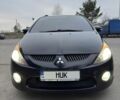 Черный Мицубиси Грандис, объемом двигателя 2.4 л и пробегом 215 тыс. км за 5300 $, фото 1 на Automoto.ua