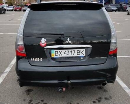 Чорний Міцубісі Грандіс, об'ємом двигуна 2.4 л та пробігом 261 тис. км за 6900 $, фото 1 на Automoto.ua