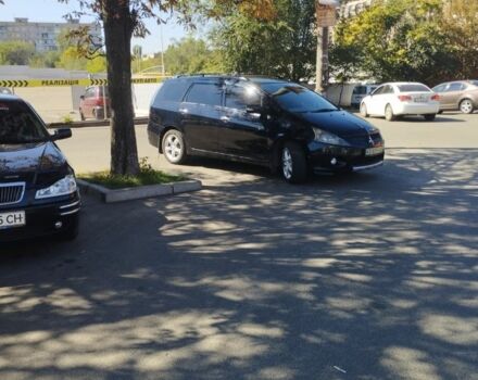 Черный Мицубиси Грандис, объемом двигателя 2.4 л и пробегом 390 тыс. км за 5500 $, фото 2 на Automoto.ua