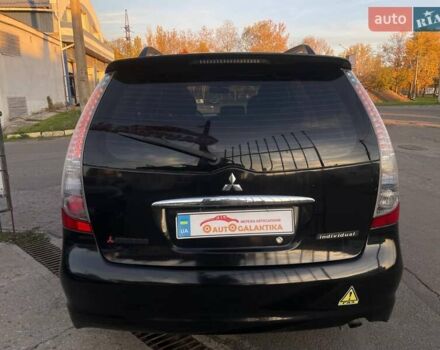 Черный Мицубиси Грандис, объемом двигателя 2.38 л и пробегом 197 тыс. км за 5299 $, фото 4 на Automoto.ua