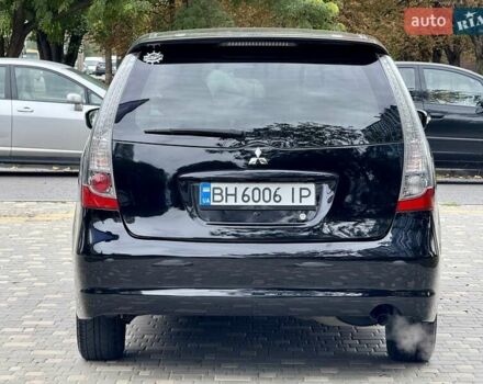 Черный Мицубиси Грандис, объемом двигателя 2.4 л и пробегом 323 тыс. км за 5999 $, фото 10 на Automoto.ua