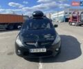 Черный Мицубиси Грандис, объемом двигателя 2.4 л и пробегом 300 тыс. км за 6100 $, фото 1 на Automoto.ua