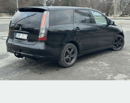 Черный Мицубиси Грандис, объемом двигателя 2 л и пробегом 290 тыс. км за 2600 $, фото 2 на Automoto.ua