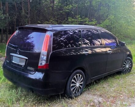 Черный Мицубиси Грандис, объемом двигателя 2.4 л и пробегом 209 тыс. км за 5500 $, фото 5 на Automoto.ua