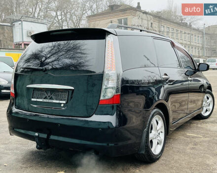 Черный Мицубиси Грандис, объемом двигателя 2.4 л и пробегом 188 тыс. км за 6800 $, фото 13 на Automoto.ua