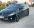 Черный Мицубиси Грандис, объемом двигателя 2.38 л и пробегом 328 тыс. км за 5300 $, фото 1 на Automoto.ua