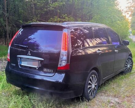 Черный Мицубиси Грандис, объемом двигателя 2.4 л и пробегом 209 тыс. км за 5500 $, фото 1 на Automoto.ua