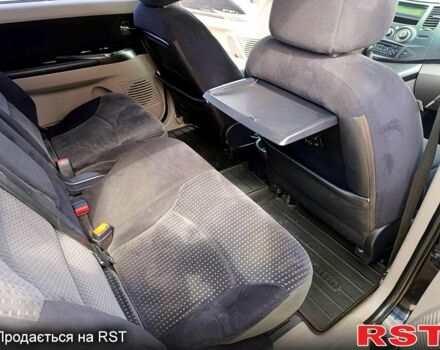 Черный Мицубиси Грандис, объемом двигателя 2.4 л и пробегом 241 тыс. км за 5400 $, фото 5 на Automoto.ua