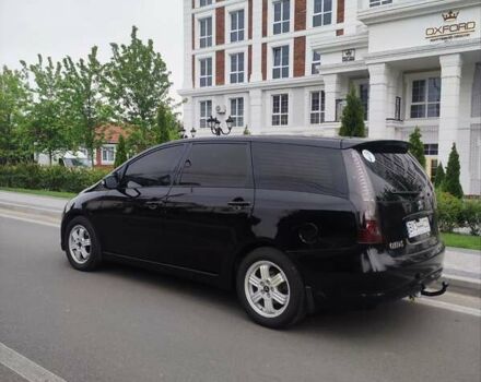 Черный Мицубиси Грандис, объемом двигателя 2.4 л и пробегом 315 тыс. км за 5800 $, фото 2 на Automoto.ua