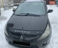 Черный Мицубиси Грандис, объемом двигателя 2.4 л и пробегом 294 тыс. км за 6239 $, фото 1 на Automoto.ua