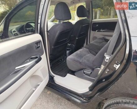 Черный Мицубиси Грандис, объемом двигателя 2.38 л и пробегом 215 тыс. км за 5900 $, фото 12 на Automoto.ua