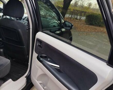 Черный Мицубиси Грандис, объемом двигателя 2.38 л и пробегом 215 тыс. км за 5900 $, фото 18 на Automoto.ua