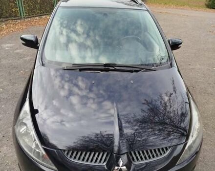 Черный Мицубиси Грандис, объемом двигателя 2.38 л и пробегом 215 тыс. км за 5900 $, фото 10 на Automoto.ua