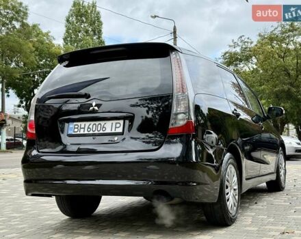 Черный Мицубиси Грандис, объемом двигателя 2.4 л и пробегом 323 тыс. км за 5999 $, фото 5 на Automoto.ua