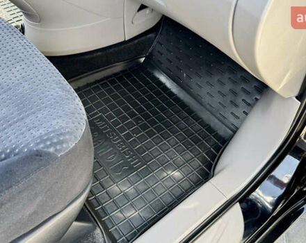 Черный Мицубиси Грандис, объемом двигателя 2.4 л и пробегом 121 тыс. км за 6450 $, фото 63 на Automoto.ua