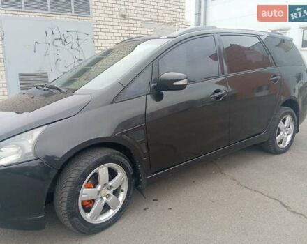 Черный Мицубиси Грандис, объемом двигателя 2.38 л и пробегом 272 тыс. км за 7000 $, фото 8 на Automoto.ua