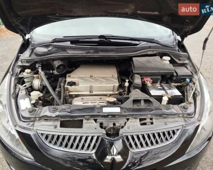 Черный Мицубиси Грандис, объемом двигателя 2.38 л и пробегом 215 тыс. км за 5900 $, фото 25 на Automoto.ua