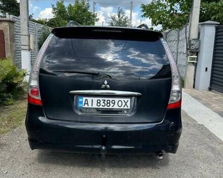 Черный Мицубиси Грандис, объемом двигателя 2.38 л и пробегом 318 тыс. км за 6500 $, фото 3 на Automoto.ua