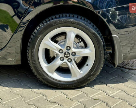 Черный Мицубиси Грандис, объемом двигателя 2.4 л и пробегом 121 тыс. км за 6450 $, фото 36 на Automoto.ua