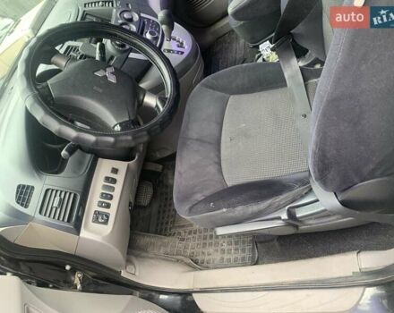 Черный Мицубиси Грандис, объемом двигателя 2.4 л и пробегом 209 тыс. км за 5500 $, фото 6 на Automoto.ua