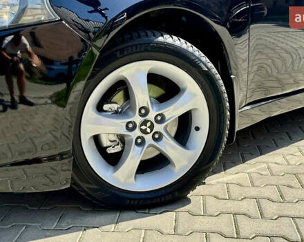 Черный Мицубиси Грандис, объемом двигателя 2.4 л и пробегом 121 тыс. км за 6450 $, фото 32 на Automoto.ua