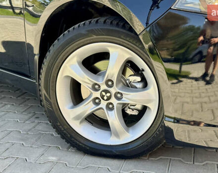 Черный Мицубиси Грандис, объемом двигателя 2.4 л и пробегом 121 тыс. км за 6450 $, фото 10 на Automoto.ua