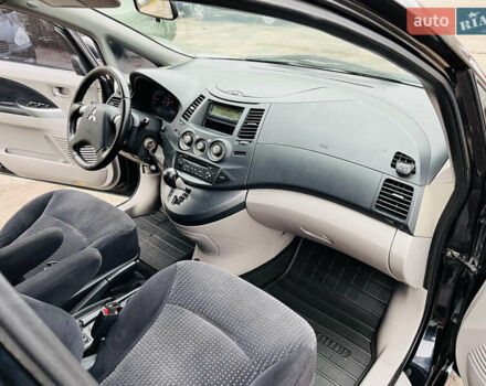 Черный Мицубиси Грандис, объемом двигателя 2.4 л и пробегом 188 тыс. км за 6800 $, фото 27 на Automoto.ua