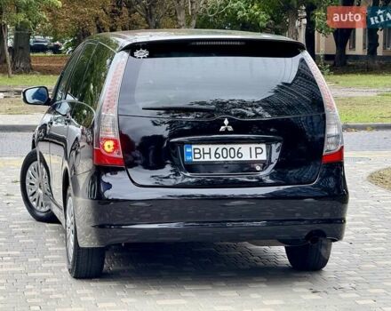 Черный Мицубиси Грандис, объемом двигателя 2.4 л и пробегом 323 тыс. км за 5999 $, фото 29 на Automoto.ua