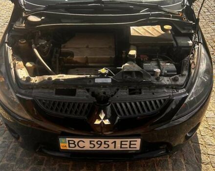 Чорний Міцубісі Грандіс, об'ємом двигуна 2.4 л та пробігом 323 тис. км за 4900 $, фото 12 на Automoto.ua