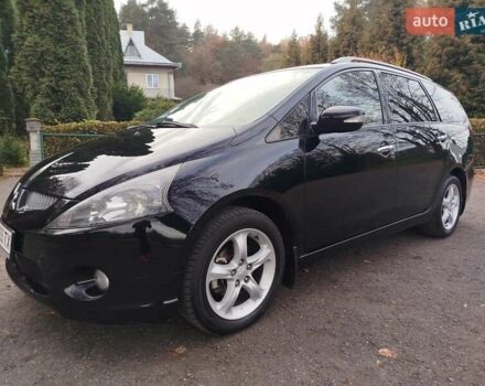 Черный Мицубиси Грандис, объемом двигателя 2.38 л и пробегом 215 тыс. км за 5900 $, фото 1 на Automoto.ua