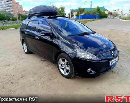 Черный Мицубиси Грандис, объемом двигателя 2.4 л и пробегом 241 тыс. км за 5400 $, фото 3 на Automoto.ua